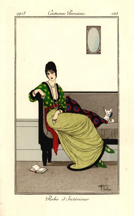 Framed Print : Woman in fashionable outfit seated on a sofa with