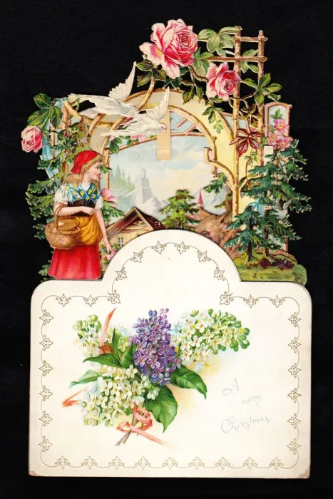 Framed Print : Woman in a garden on a cutout Christmas card