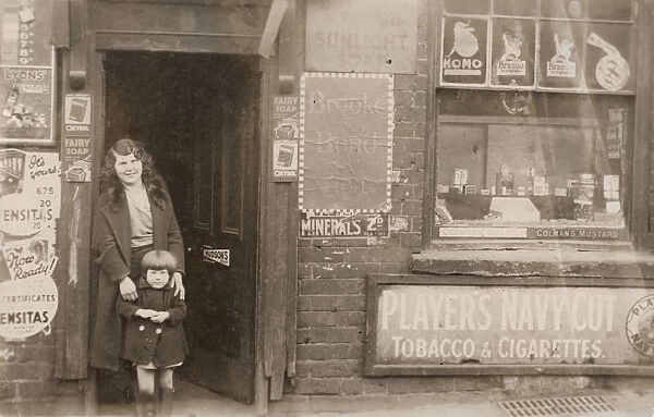 Woman and girl outside a shop, Handsworth, Birmingham