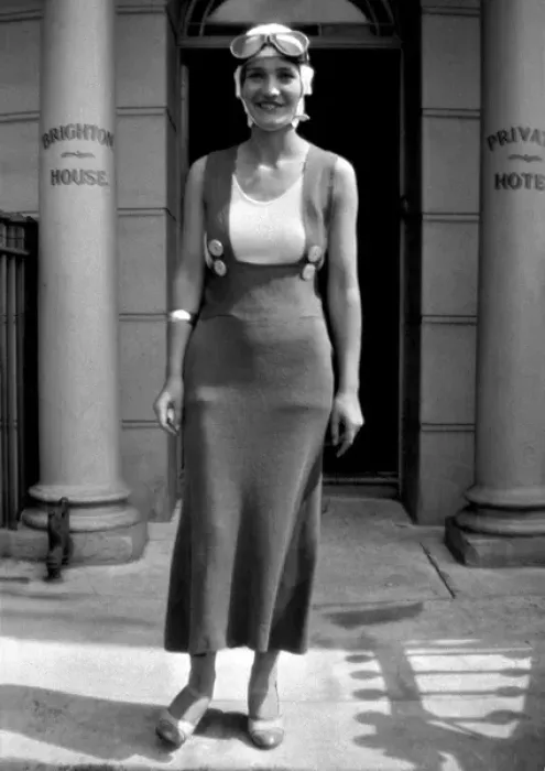 Framed Print : Woman in goggles outside hotel Framed Print : Woman in goggles outside hotel
