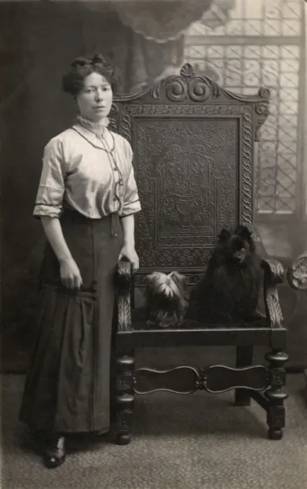 Framed Print : Woman with two hairy dogs