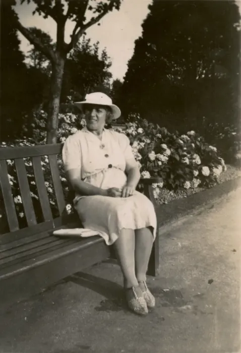 Framed Print : Woman on holiday, sitting on a bench Framed Print : Woman on holiday, sitting on a bench