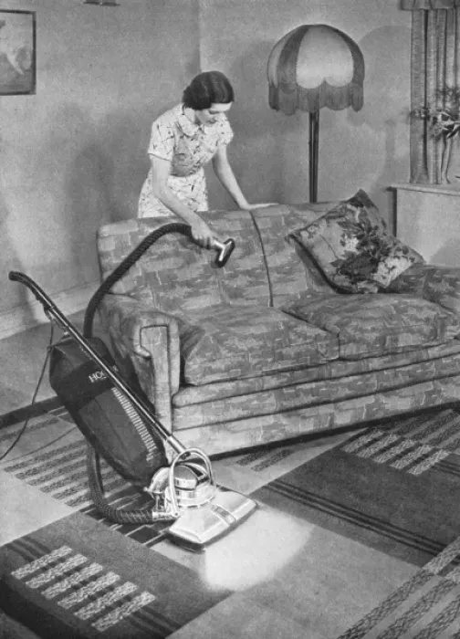 Framed Print : Woman hoovering Framed Print : Woman hoovering