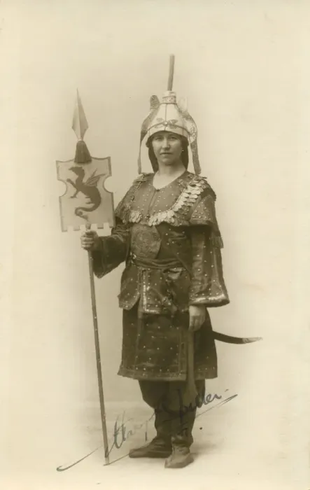 Framed Print : A woman in an interesting militaristic exotic costume, holding a standard. Date: c Framed Print : A woman in an interesting militaristic exotic costume, holding a standard. Date: c