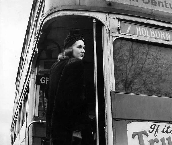 Woman on London routemaster bus, 1940s