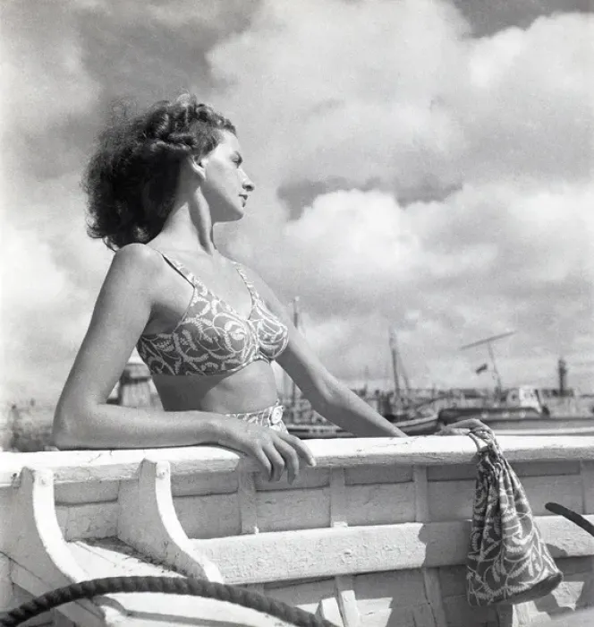 Framed Print : Woman looking out to sea