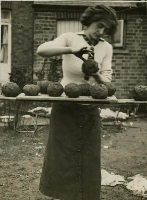 Framed Print : Woman making balls of clay and slack, West Country Framed Print : Woman making balls of clay and slack, West Country