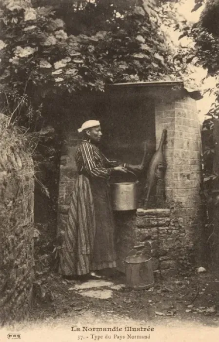 Framed Print : A woman from Normandy at the well Framed Print : A woman from Normandy at the well