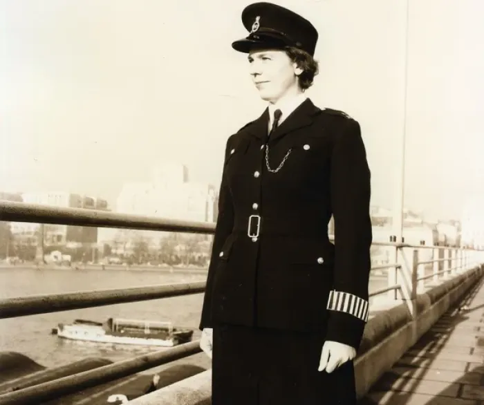 Framed Print : Woman police officer on a bridge in London Framed Print : Woman police officer on a bridge in London