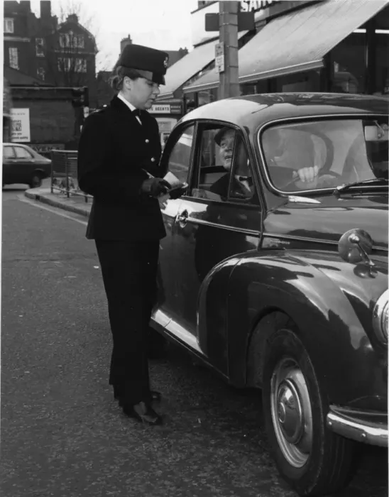 Framed Print : Woman police officer on duty in London Framed Print : Woman police officer on duty in London