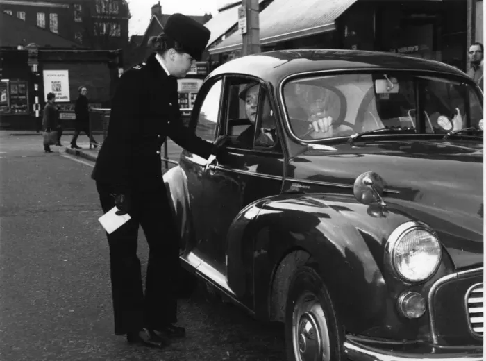 Framed Print : Woman police officer on duty in London Framed Print : Woman police officer on duty in London