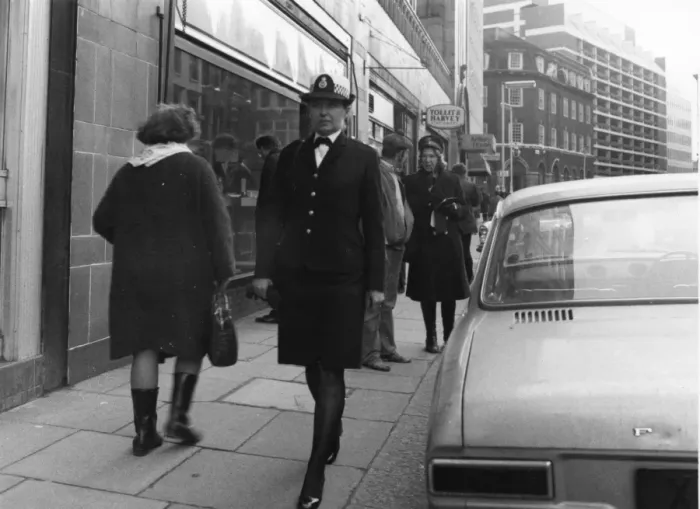 Framed Print : Woman police officer on duty in London Framed Print : Woman police officer on duty in London