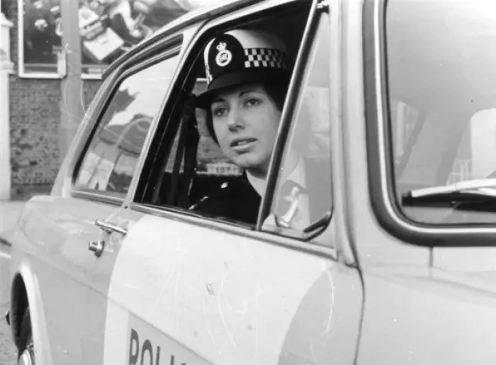 Framed Print : Woman police officer on duty in London Framed Print : Woman police officer on duty in London