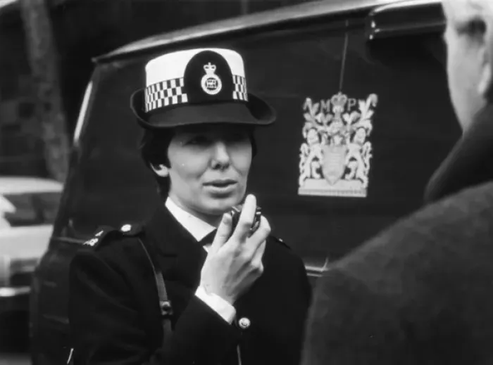 Framed Print : Woman police officer on duty in London Framed Print : Woman police officer on duty in London