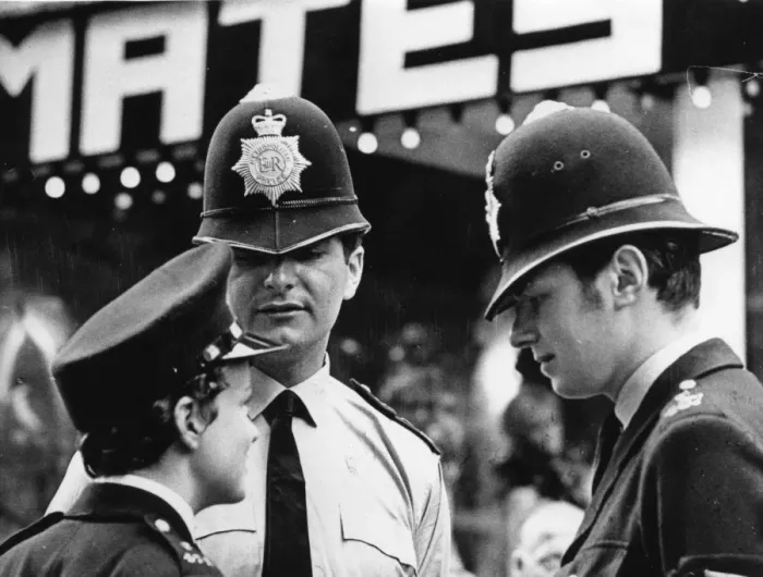 Framed Print : Woman police officer in street, London Framed Print : Woman police officer in street, London