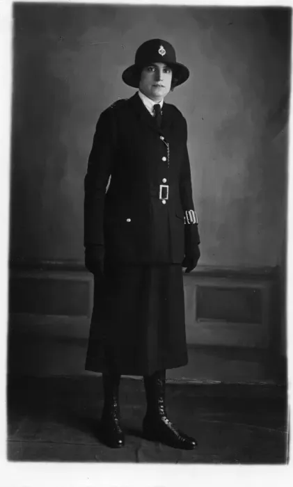 Framed Print : Woman police officer in studio photo Framed Print : Woman police officer in studio photo