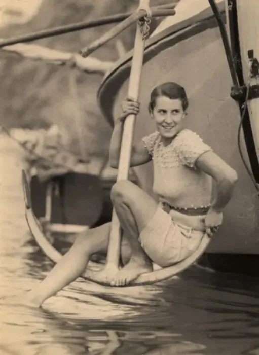 Framed Print : Woman poses on anchor Framed Print : Woman poses on anchor