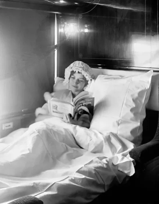 Framed Print : Woman reading in an Electric-lighted sleeper berth Framed Print : Woman reading in an Electric-lighted sleeper berth