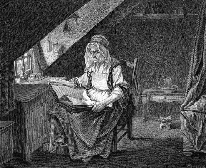 Framed Print : Woman reading in a French attic bedroom Framed Print : Woman reading in a French attic bedroom