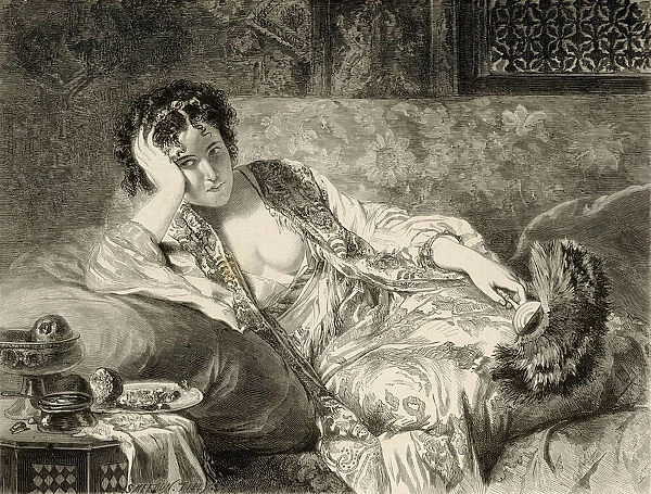 Woman reclining on couch