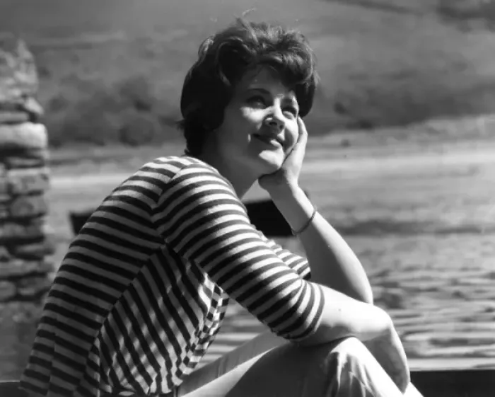 Framed Print : Woman relaxing in stripy top Framed Print : Woman relaxing in stripy top