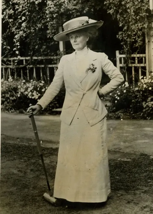 Framed Print : Woman resting during a game of croquet Framed Print : Woman resting during a game of croquet