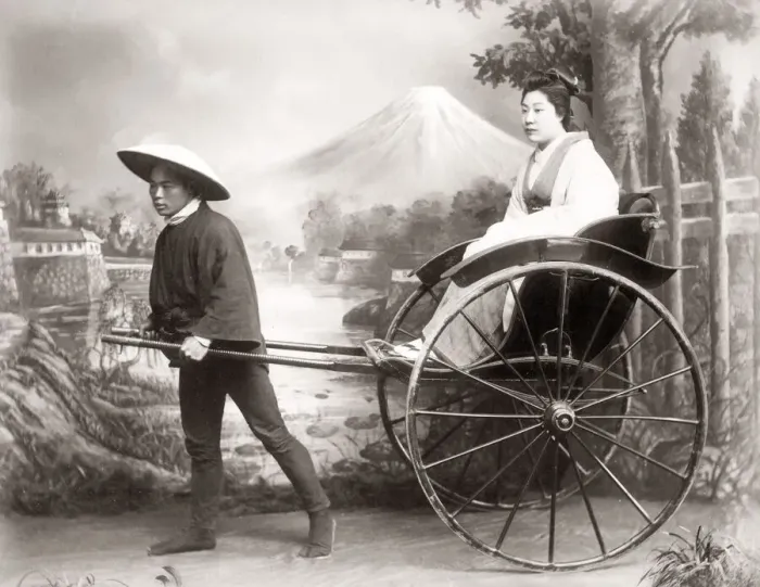 Framed Print : Woman in a rickshaw in a studio setting, Japan Framed Print : Woman in a rickshaw in a studio setting, Japan