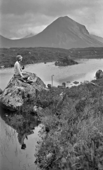 Framed Print : Woman on rock, Portree, Isle of Skye, Scotland Framed Print : Woman on rock, Portree, Isle of Skye, Scotland
