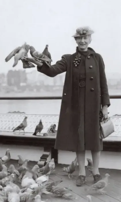 Framed Print : Woman at seaside with pigeons Framed Print : Woman at seaside with pigeons