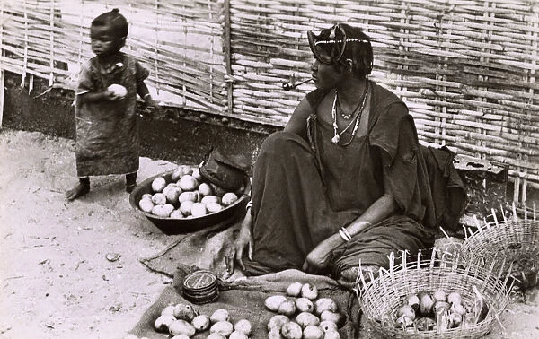 Woman selling Mangoes on the street - Dakar, Senegal