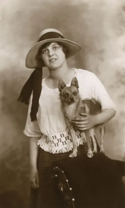 Framed Print : Woman with small dog Framed Print : Woman with small dog