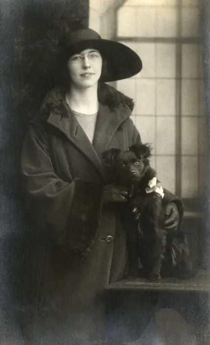 Framed Print : Woman with small dog Framed Print : Woman with small dog