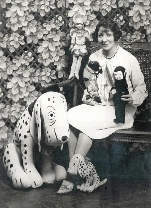 Framed Print : Woman with soft toys including Dismal Desmond Framed Print : Woman with soft toys including Dismal Desmond