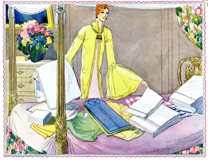 Framed Print : Woman sorting out laundry on four poster bed Framed Print : Woman sorting out laundry on four poster bed