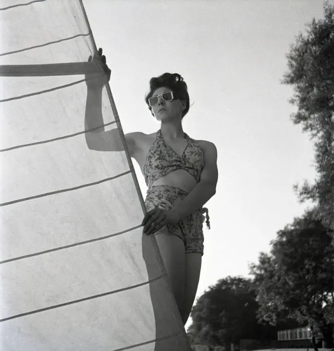 Framed Print : Woman on St Ives beach with yacht sail Framed Print : Woman on St Ives beach with yacht sail