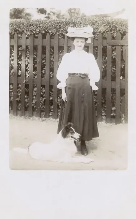 Framed Print : Woman taking a dog for a walk Framed Print : Woman taking a dog for a walk
