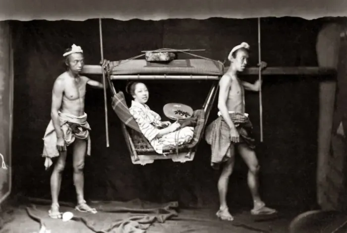 Framed Print : Woman in a travelling chair or Kago, Japan circa 1870s. Date: circa 1870s Framed Print : Woman in a travelling chair or Kago, Japan circa 1870s. Date: circa 1870s