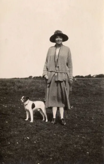 Framed Print : Woman out walking with a dog, Eastbourne, Sussex Framed Print : Woman out walking with a dog, Eastbourne, Sussex