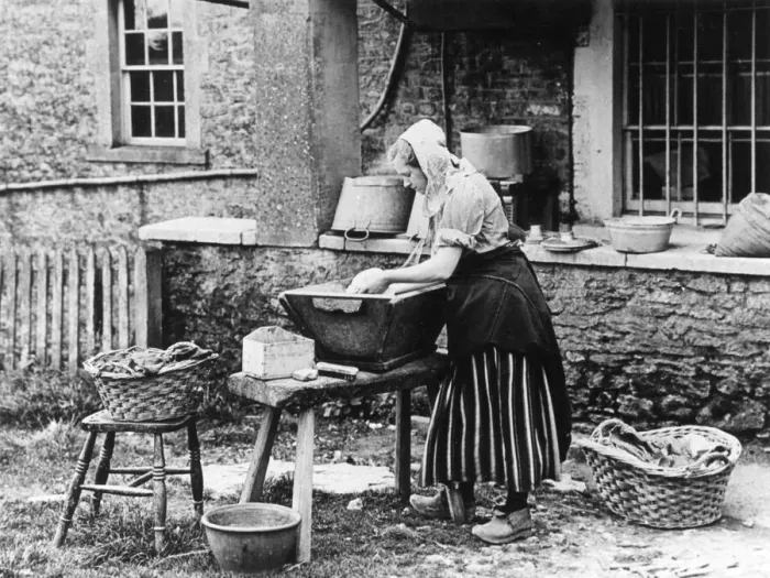 Framed Print : Woman on wash day in the country, 1890s Framed Print : Woman on wash day in the country, 1890s