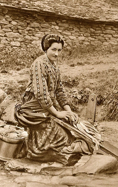 Woman washing clothes, Savoie district, France