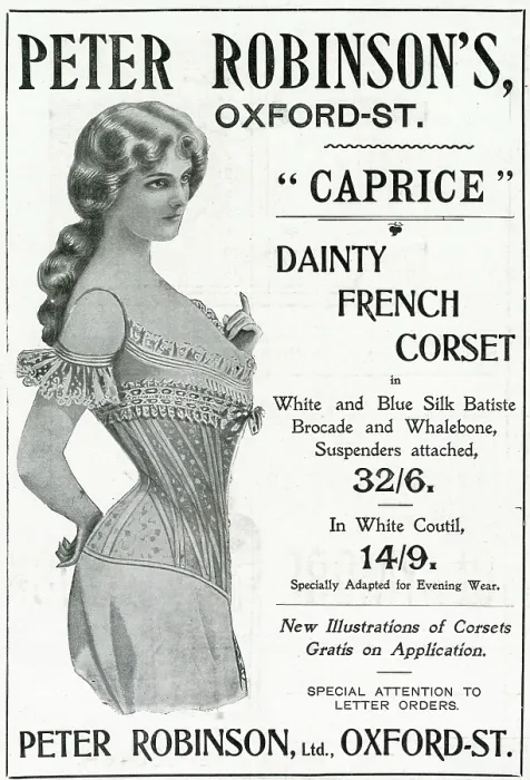 Framed Print : Woman wearing a dainty French corset with white and blue silk batiste, brocade and whalebone, suspenders attached. Date: 1902 Framed Print : Woman wearing a dainty French corset with white and blue silk batiste, brocade and whalebone, suspenders attached. Date: 1902