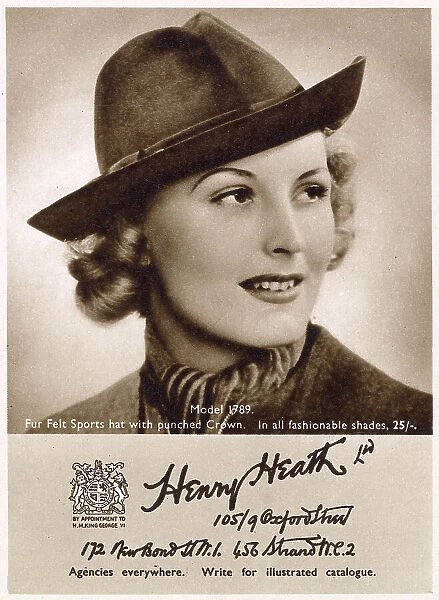 Woman wearing felt homburg hat. Date: 1940