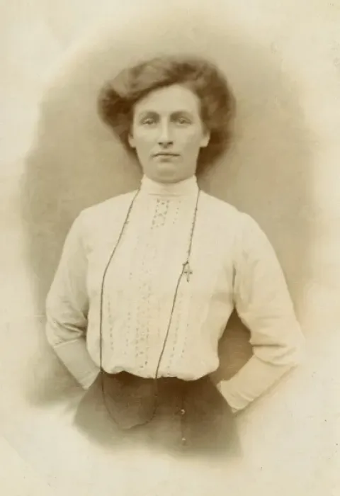 Framed Print : Woman wearing a high-necked broderie-anglaise blouse Framed Print : Woman wearing a high-necked broderie-anglaise blouse