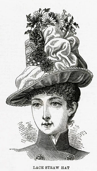 Woman wearing lace straw hat with deep maize shade, trimmed with maize crepe
