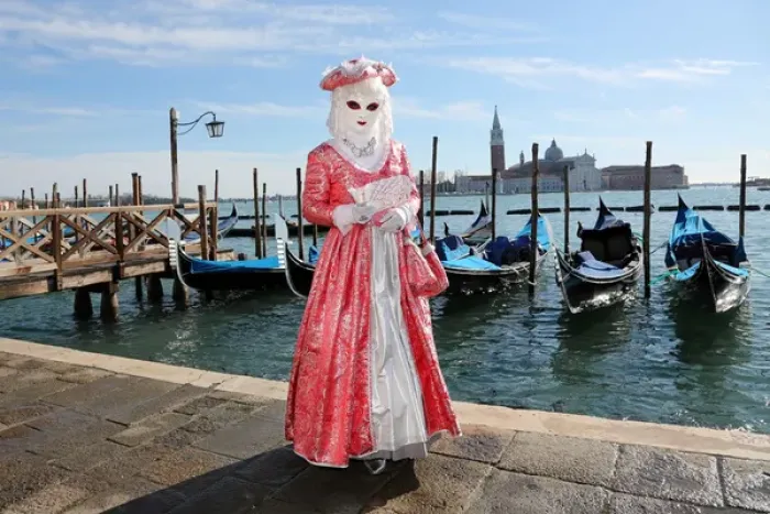 Framed Print : Woman wearing Venice Carnival Costume and Gondolas Framed Print : Woman wearing Venice Carnival Costume and Gondolas