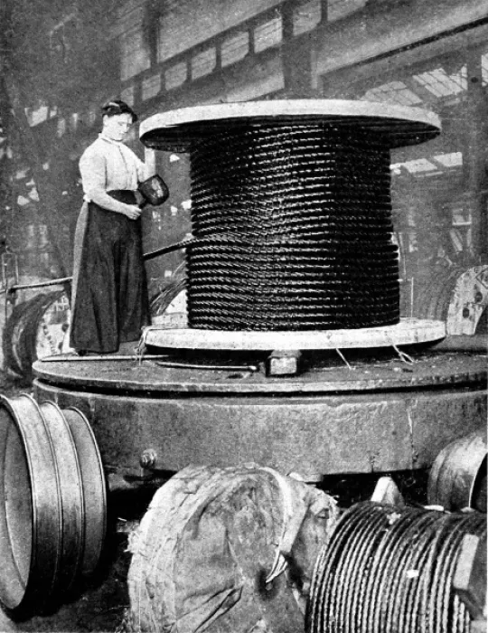 Framed Print : Woman working in a rope works, 1916 Framed Print : Woman working in a rope works, 1916