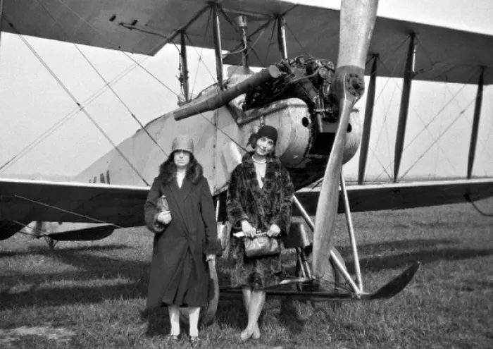 Framed Print : Two women in front of biplane Framed Print : Two women in front of biplane