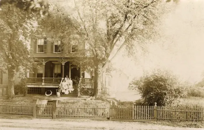 Framed Print : Women and children posing on front steps of house, USA Framed Print : Women and children posing on front steps of house, USA