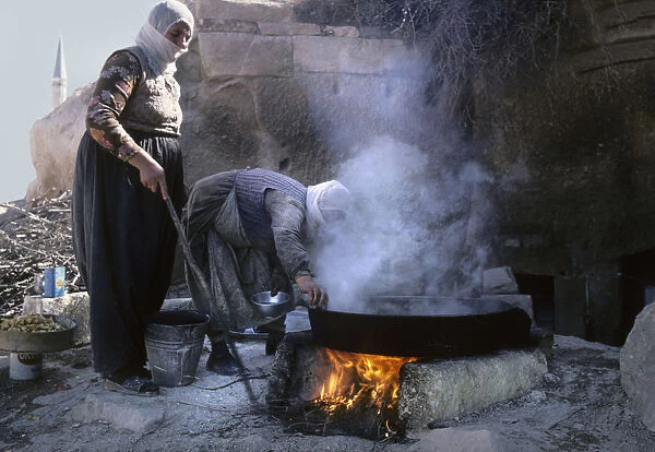 Two women cooking - near mosque, Uchisar, Cappadocia, Turkey