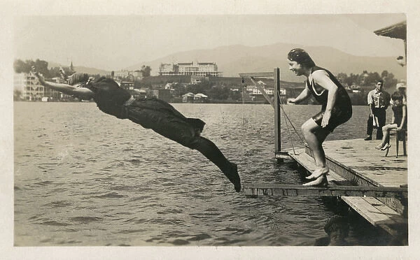 Women diving, Lake Placid, New York State, USA